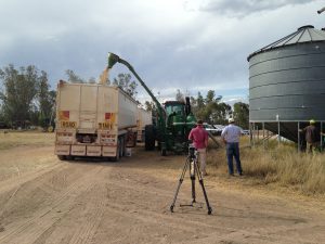 Filming the loading of the wheat