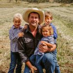 Jules with his children in the field.